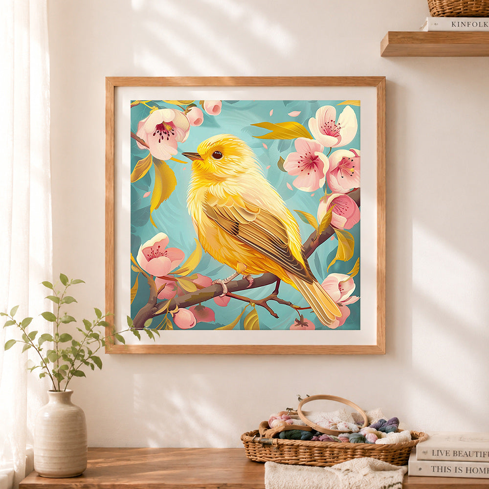 Finished golden spring bird and cherry blossom cross stitch artwork displayed as home decor