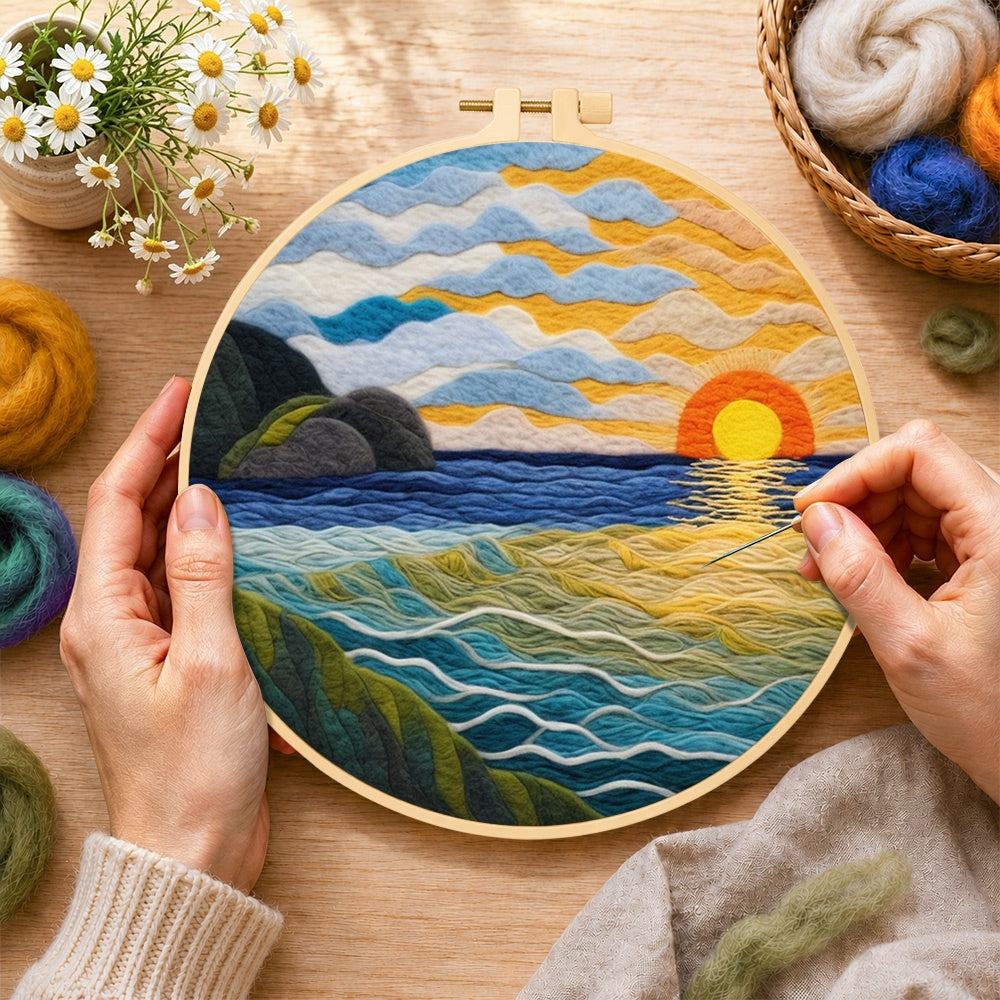 Creating the golden sunset and textured rolling waves wool painting by hand with a felting needle