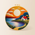 Golden sunset and tranquil lake needle felting kit for beginners with a round wooden frame
