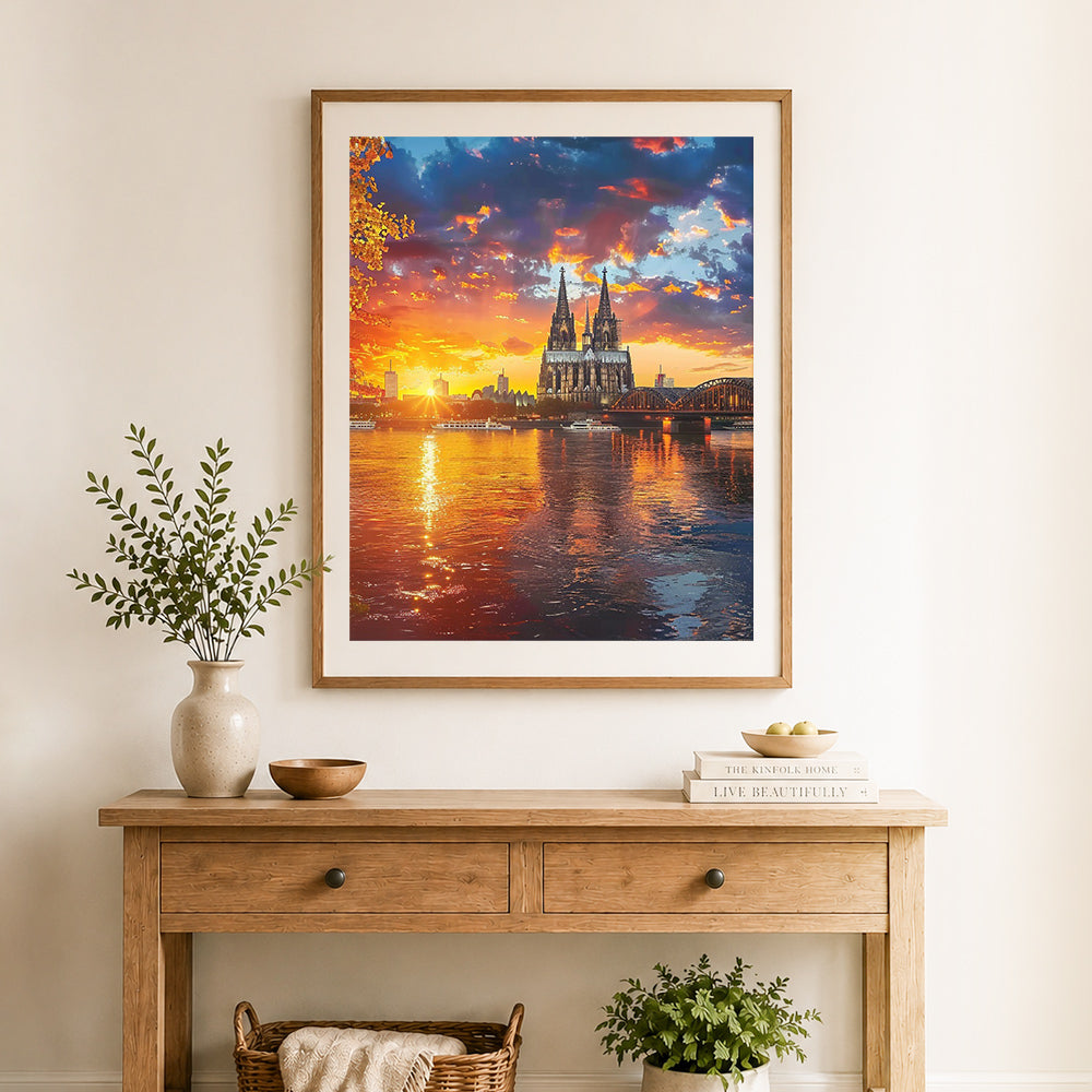 Finished golden sunset cathedral cross stitch artwork displayed as home decor