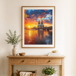 Finished golden sunset cathedral cross stitch artwork displayed as home decor