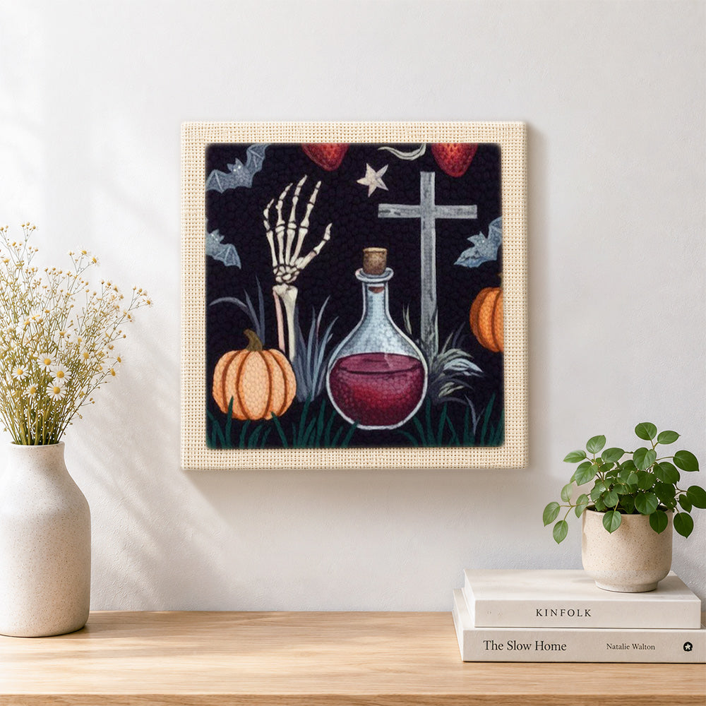 Finished gothic halloween potion scene artwork displayed on a wall