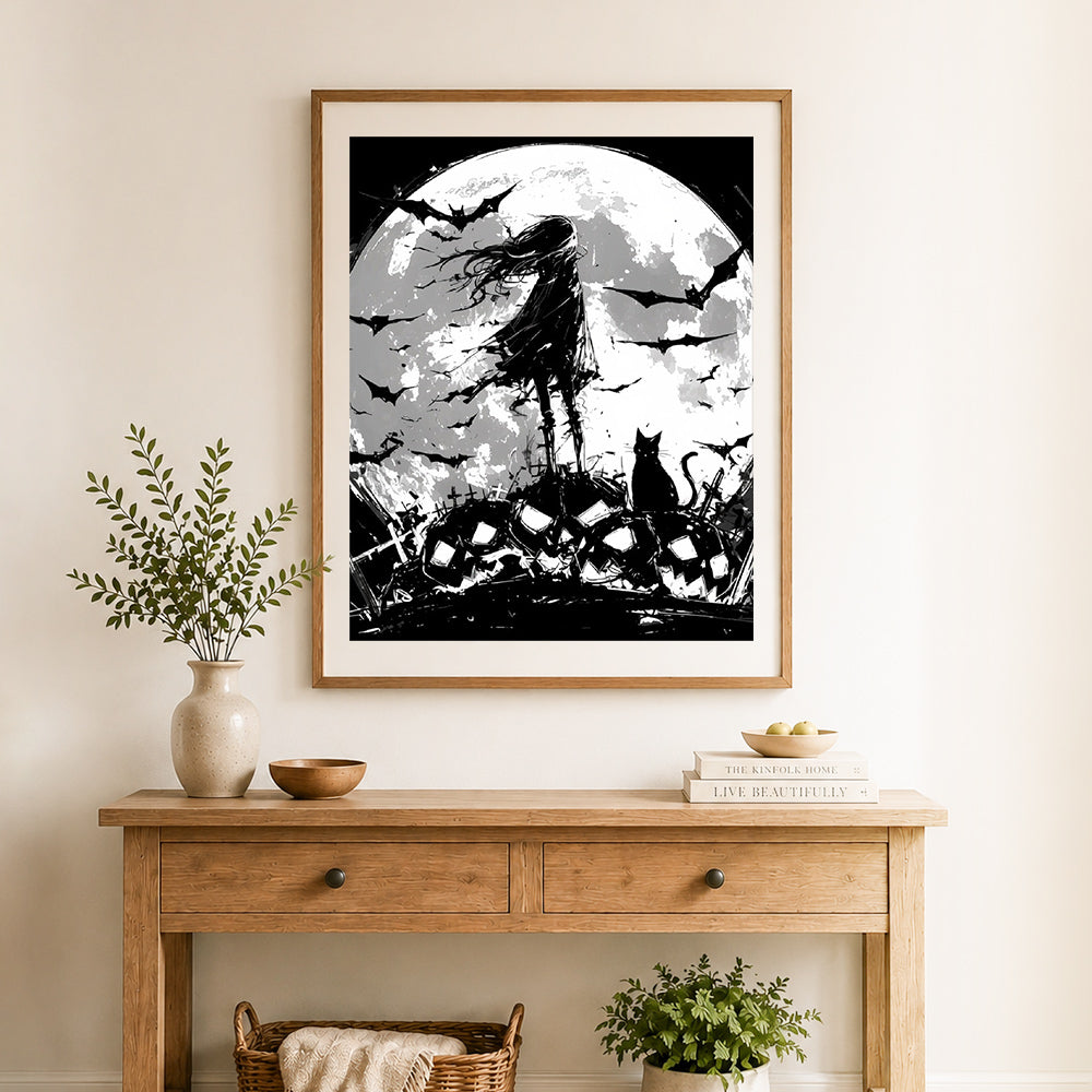 Finished gothic moon silhouette cross stitch artwork displayed as home decor