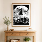 Finished gothic moon silhouette cross stitch artwork displayed as home decor