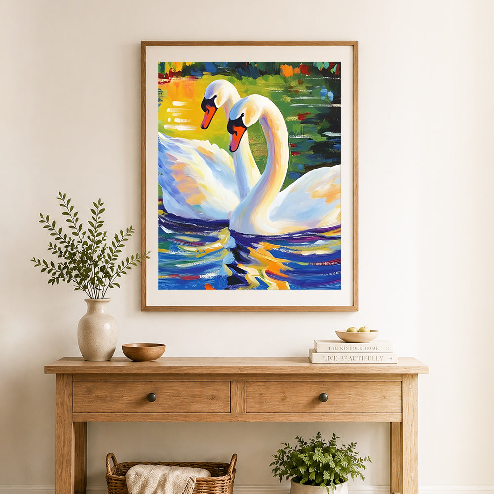 Finished graceful white swans cross stitch artwork displayed as home decor