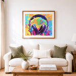 Finished graffiti headphones cross stitch artwork displayed as home decor