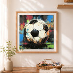 Finished graffiti soccer ball cross stitch artwork displayed as home decor