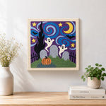 Finished graveyard ghosts night scene artwork displayed on a wall