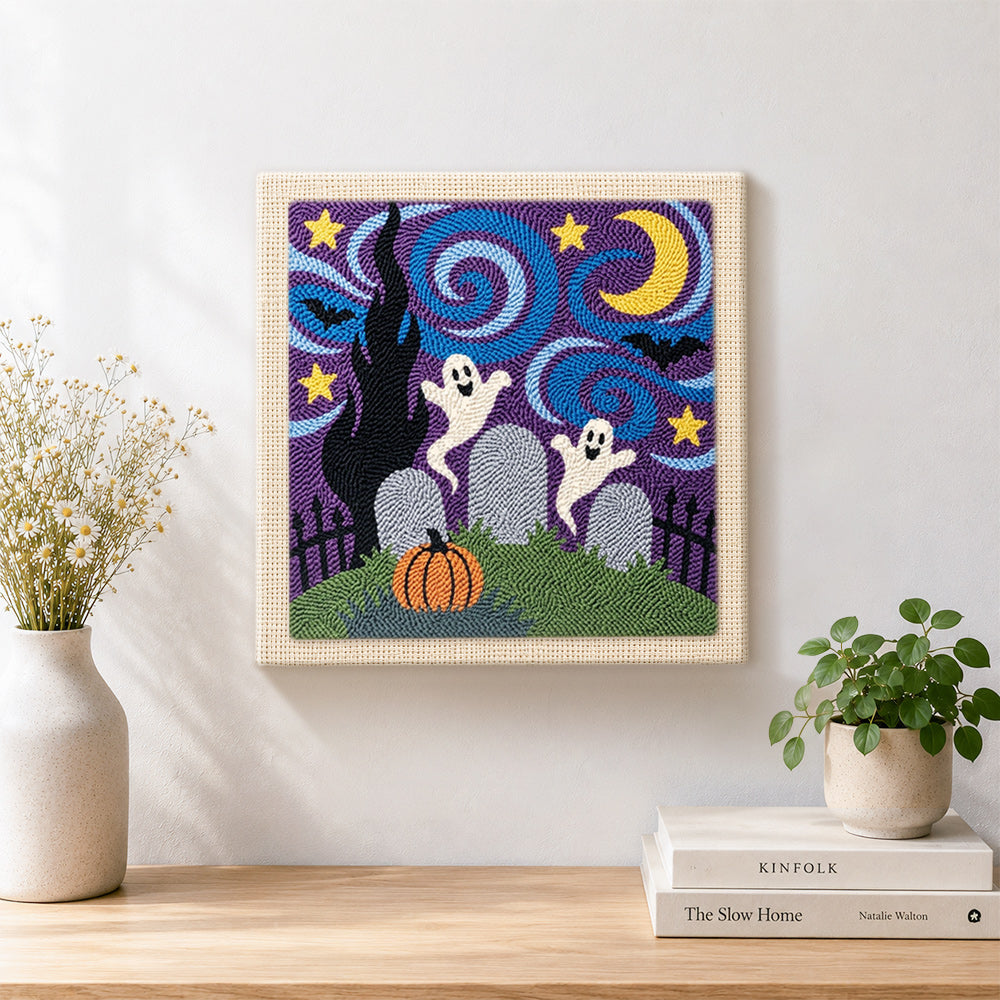Finished graveyard ghosts night scene artwork displayed on a wall