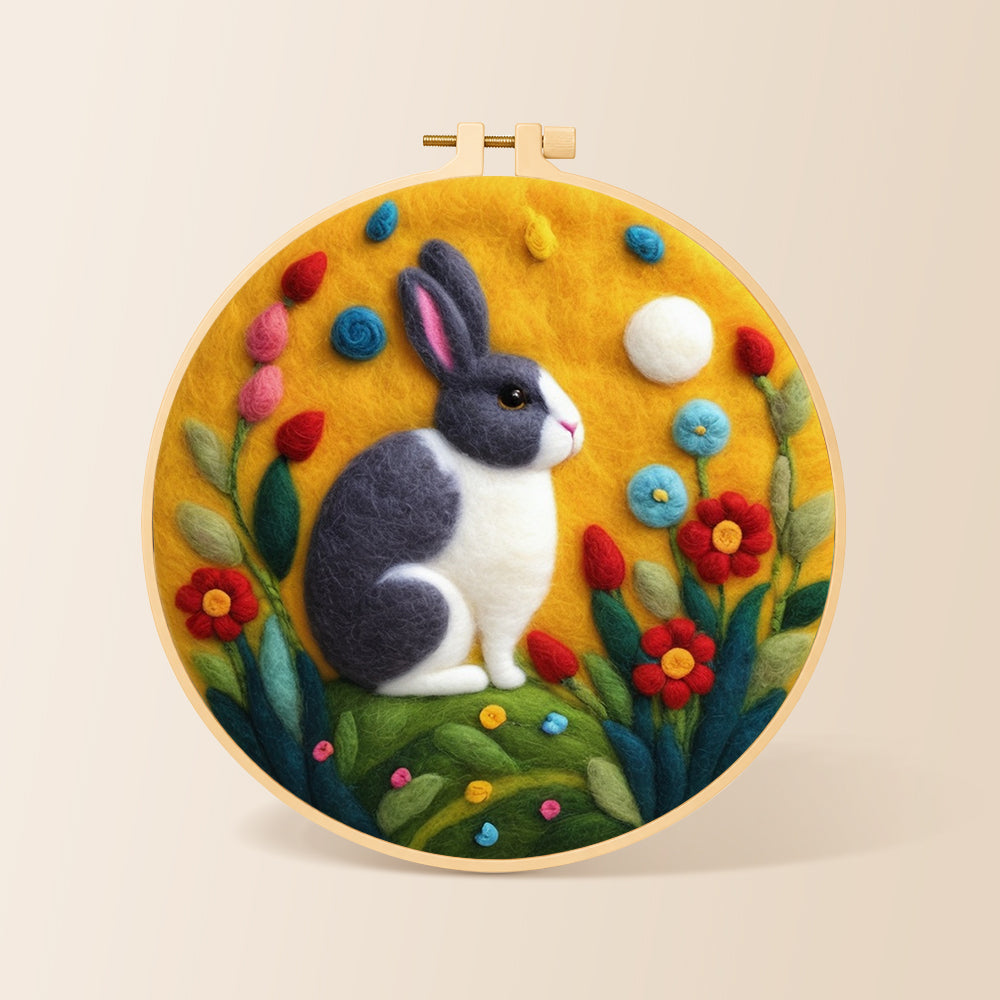 Gray and white rabbit among flowers needle felting kit for beginners with a round wooden frame
