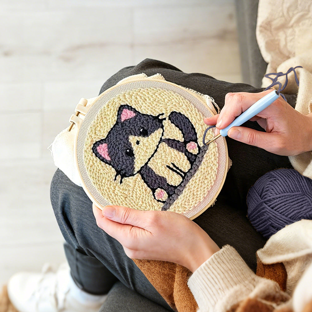 Creating handmade gray kitten punch needle artwork