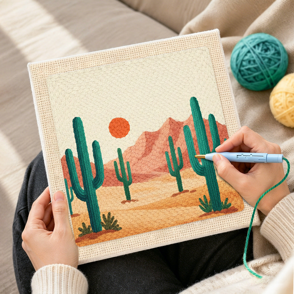 Creating handmade green cactus and pink mountains punch needle artwork