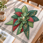 Green dragon handmade quilted bow displayed on a table as seasonal home decor