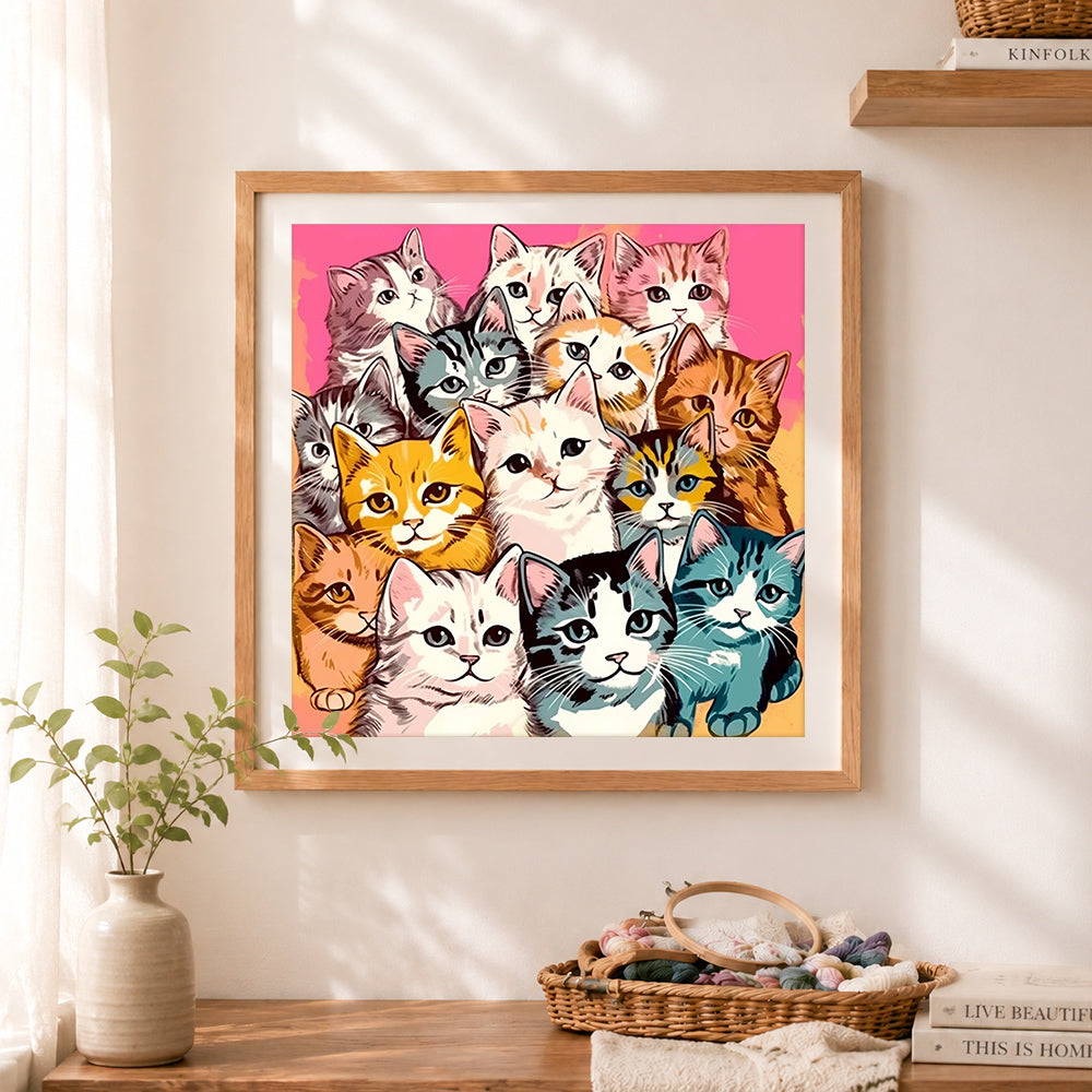 Finished group of cute kittens cross stitch artwork displayed as home decor