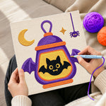 Creating handmade halloween bat lantern punch needle artwork