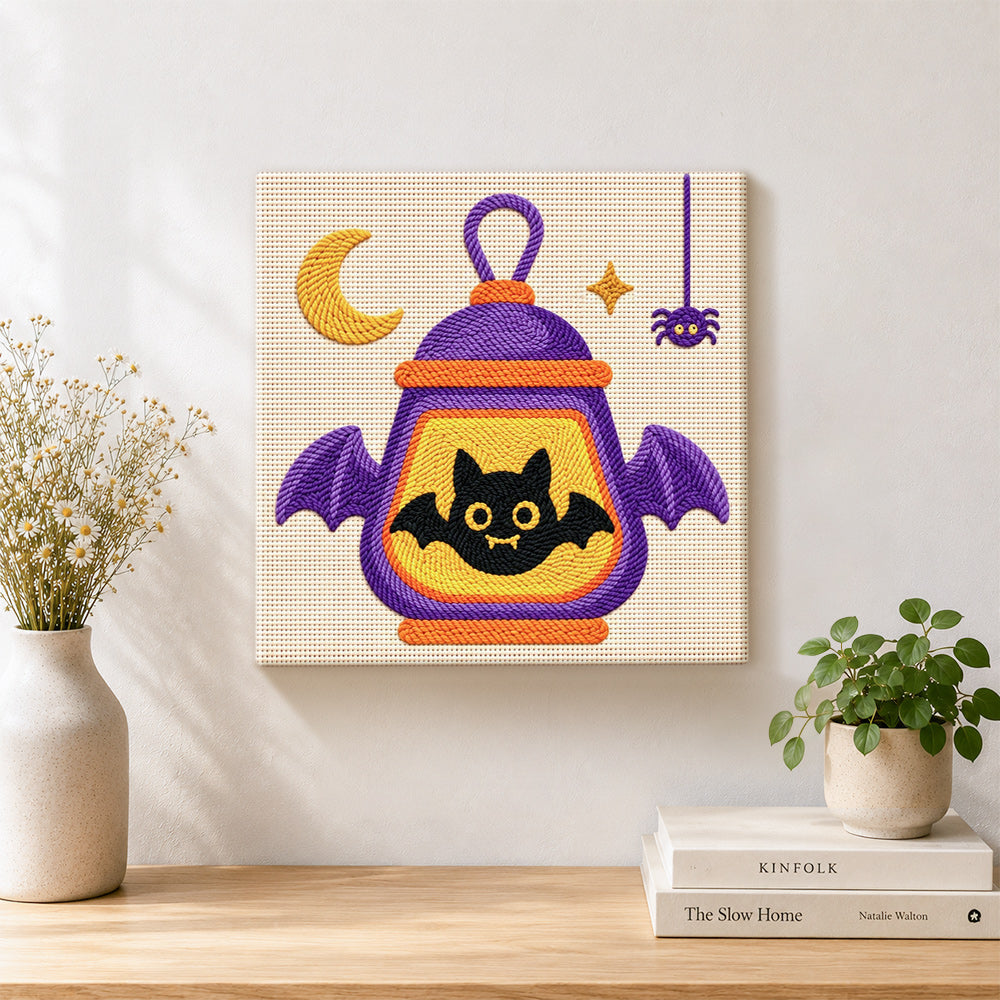 Finished halloween bat lantern artwork displayed on a wall