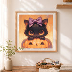 Finished halloween black kitten cross stitch artwork displayed as home decor