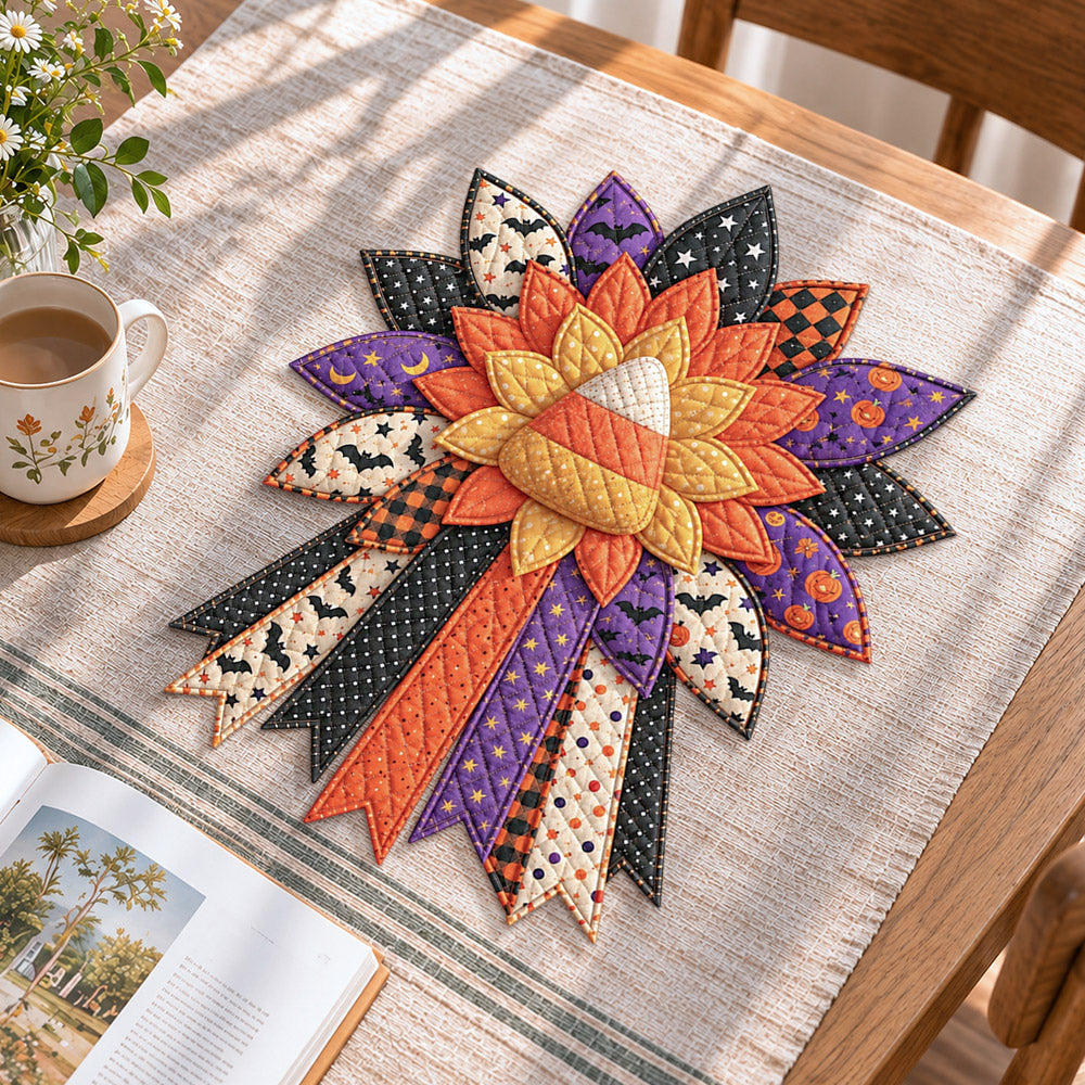 Halloween candy corn handmade quilted bow displayed on a table as seasonal home decor