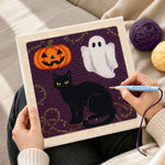 Creating handmade halloween cat and ghost punch needle artwork