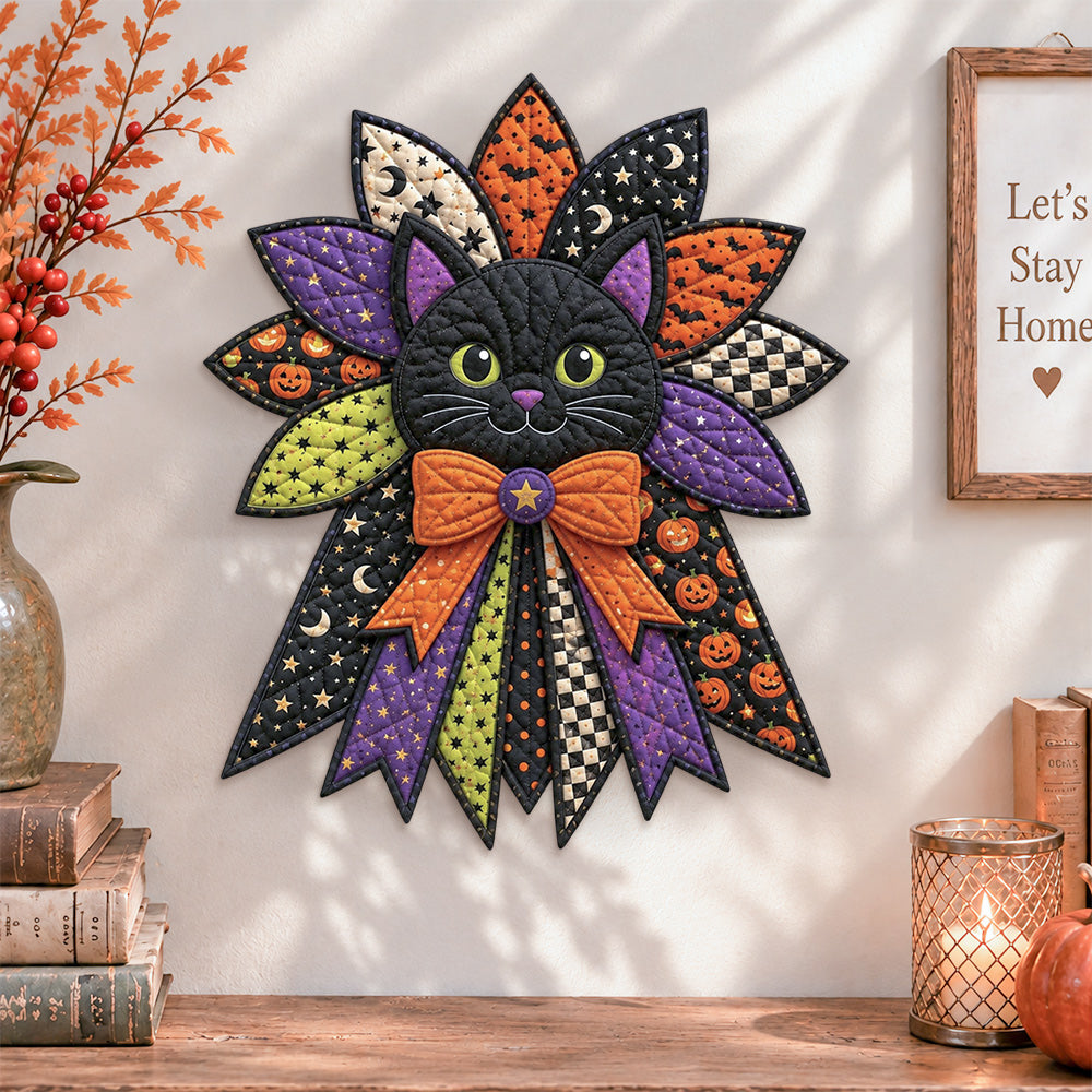 Halloween cat night quilted bow displayed as handmade wall decor in a cozy home