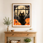 Finished halloween cat under full moon cross stitch artwork displayed as home decor