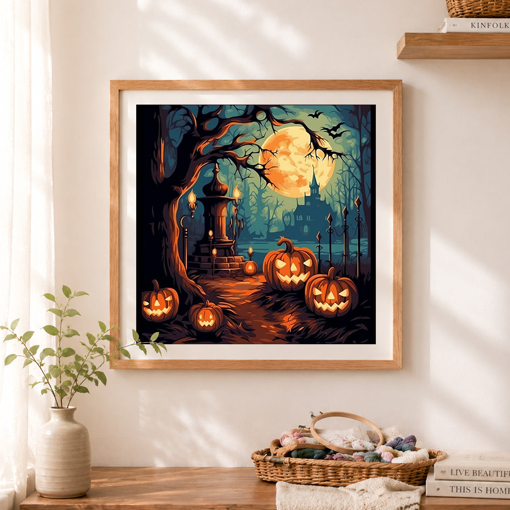 Finished halloween graveyard scene cross stitch artwork displayed as home decor