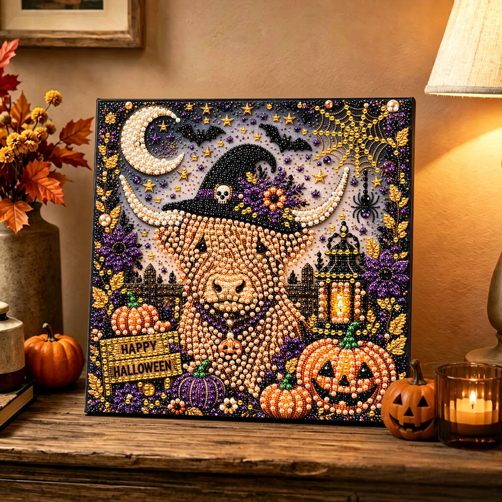 Finished halloween highland cow with witch hat pearl diamond painting artwork displayed as holiday home decor