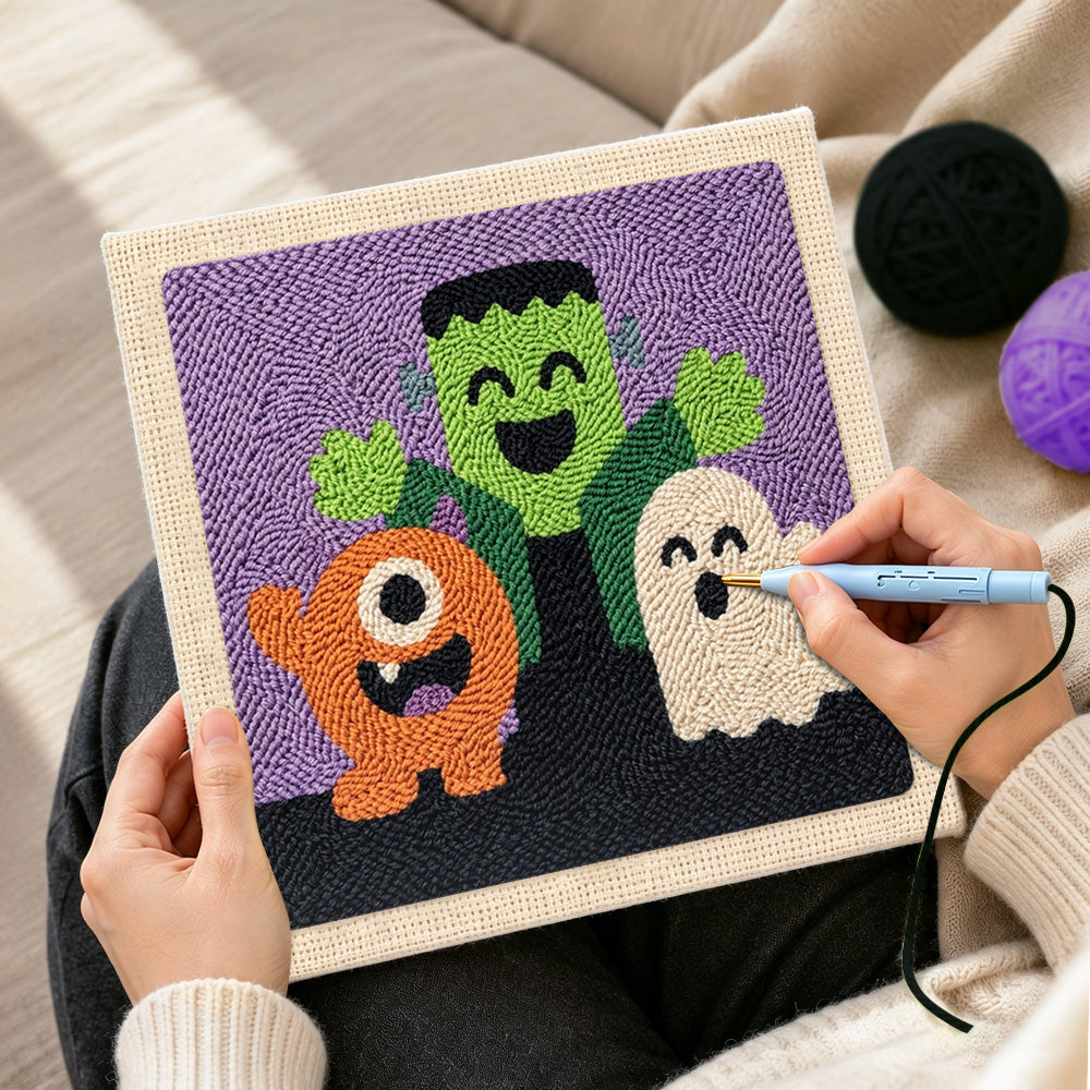 Creating handmade halloween monster trio punch needle artwork