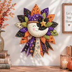 Halloween moon quilted bow displayed as handmade wall decor in a cozy home