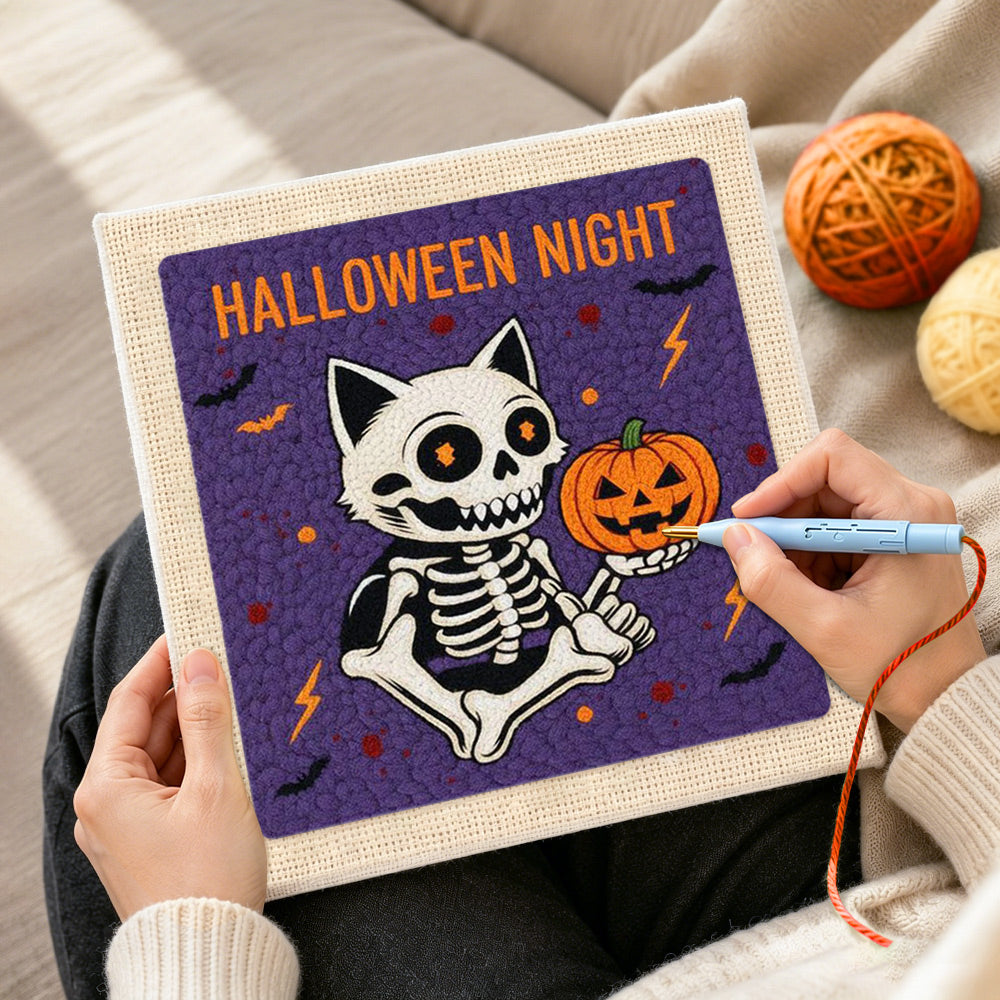 Creating handmade halloween night skeleton cat punch needle artwork