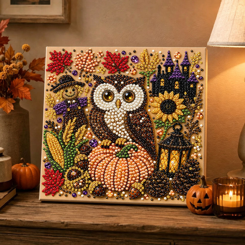 Finished halloween owl with scarecrow pearl diamond painting artwork displayed as holiday home decor