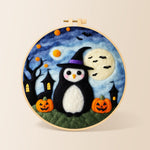 Halloween penguin in witch hat needle felting kit for beginners with a round wooden frame