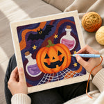 Creating handmade halloween potion and bat punch needle artwork