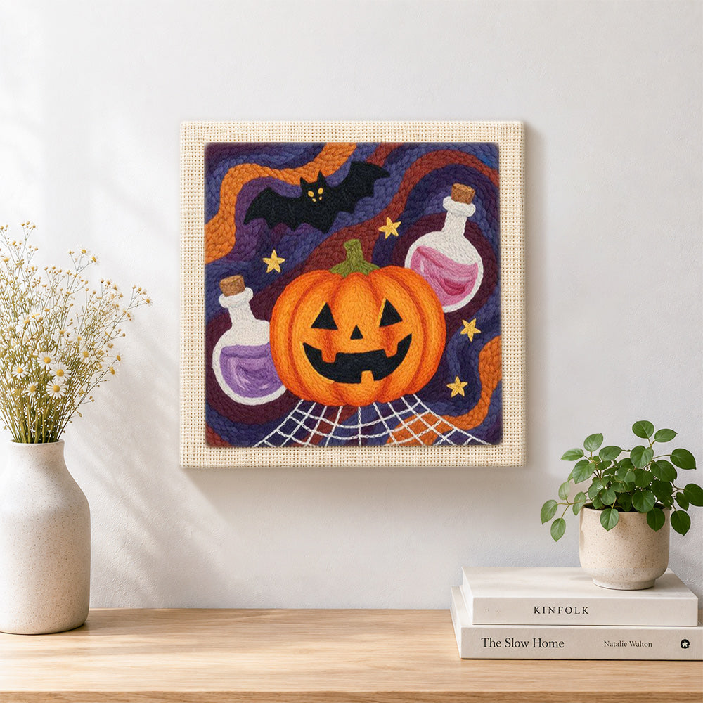 Finished halloween potion and bat artwork displayed on a wall