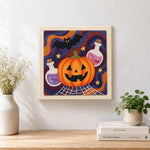 Finished halloween potion and bat artwork displayed on a wall