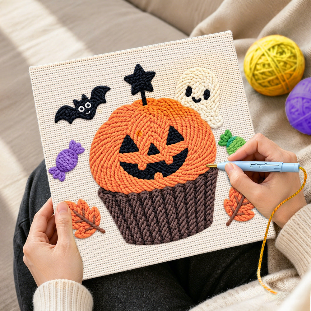 Creating handmade halloween pumpkin cupcake punch needle artwork