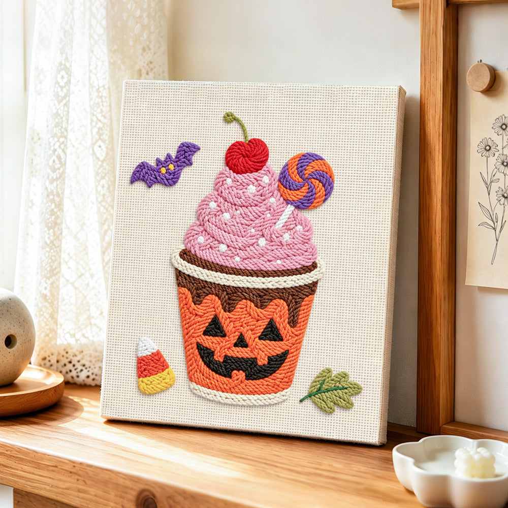 Halloween pumpkin sundae punch needle artwork displayed on a table