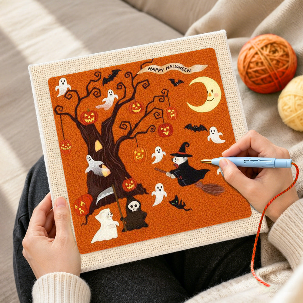 Creating handmade halloween spooky tree punch needle artwork