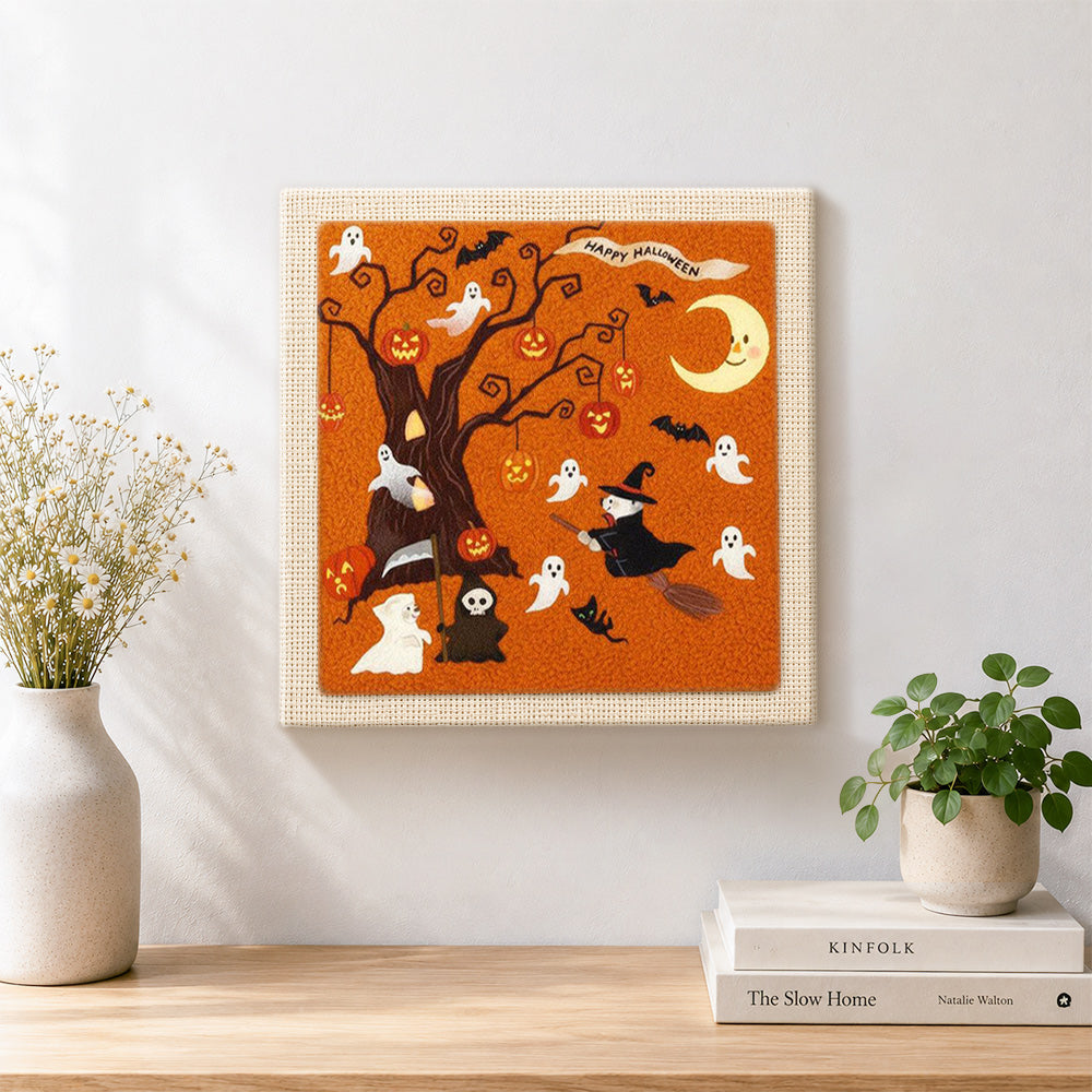 Finished halloween spooky tree artwork displayed on a wall