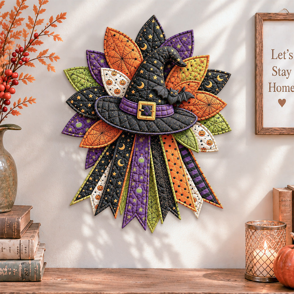 Halloween witch hat quilted bow displayed as handmade wall decor in a cozy home