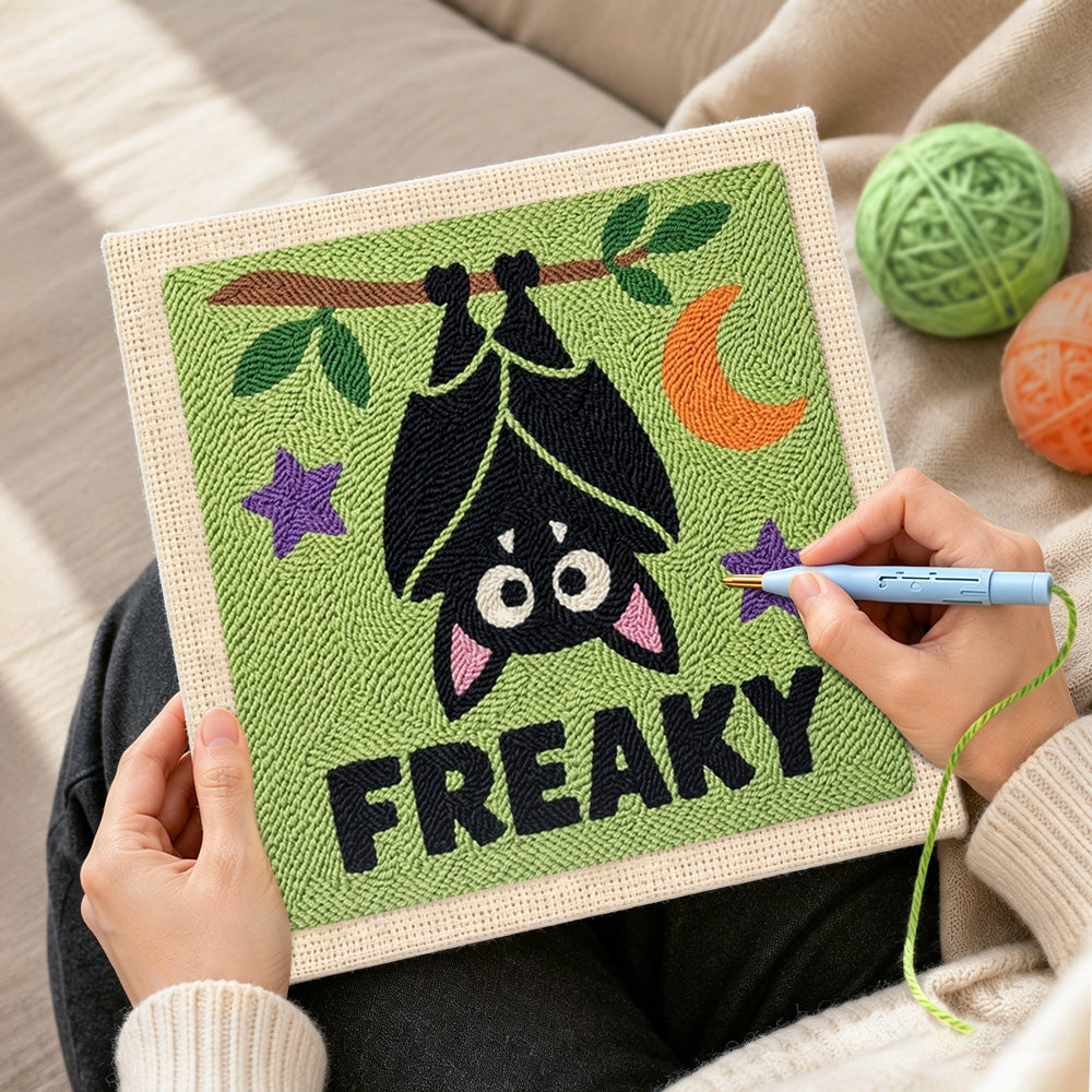 Creating handmade hanging freaky bat punch needle artwork