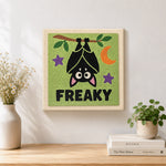 Finished hanging freaky bat artwork displayed on a wall