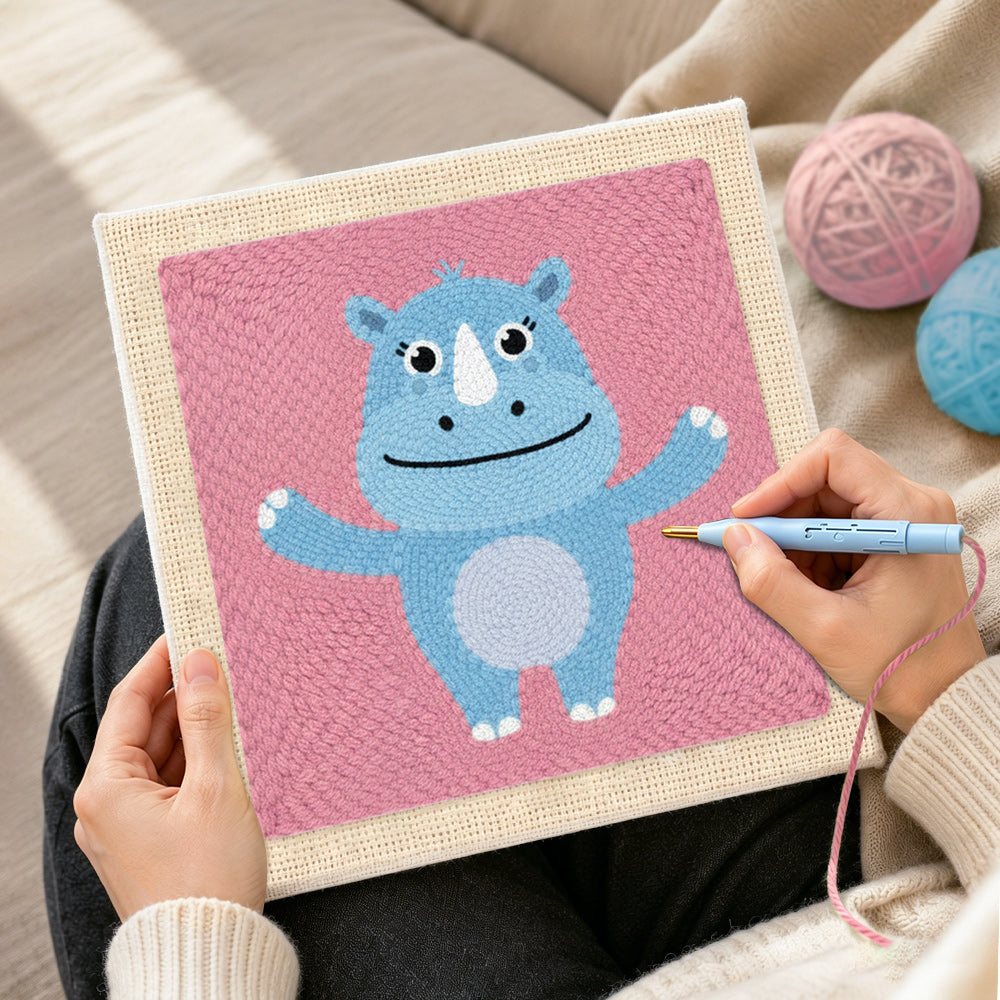 Creating handmade happy blue rhino with open arms punch needle artwork