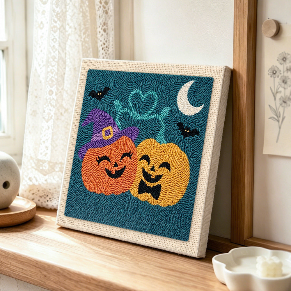 Happy couple pumpkins punch needle artwork displayed on a table