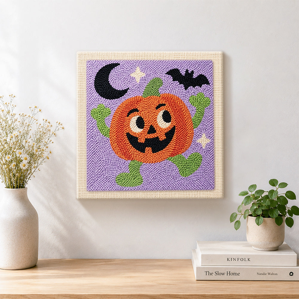 Finished happy dancing pumpkin character artwork displayed on a wall