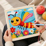 Creating handmade happy flying bee in a flower garden punch needle artwork
