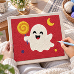 Creating handmade happy ghost with lollipop punch needle artwork