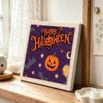 Happy halloween greeting punch needle artwork displayed on a table