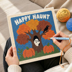 Creating handmade happy haunt tree punch needle artwork