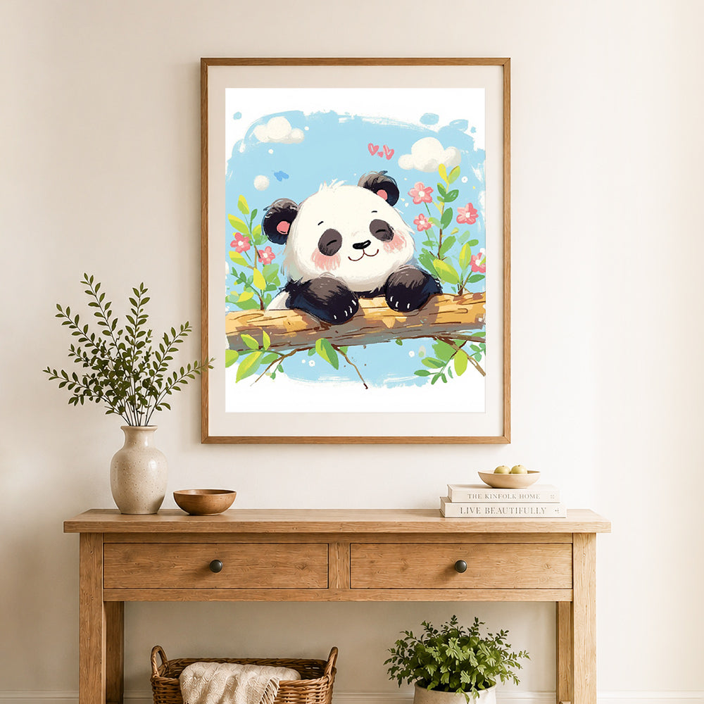 Finished happy panda on branch cross stitch artwork displayed as home decor